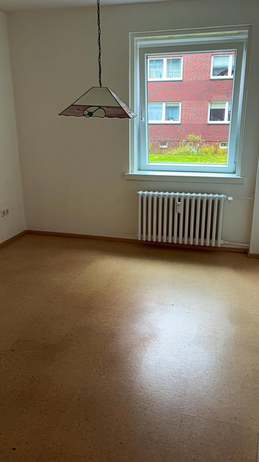 Besenrein geräumtes Wohnzimmer nach Entrümpelung in Oldenburg